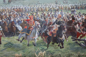 Le maréchal Ney et ses aides de camp conduisant la charge de cavalerie à Waterloo, par Louis-Jules Dumoulin (1860-1924), domaine public, via Wikimedia Commons